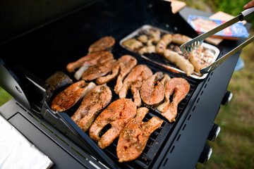 Beautiful view of tasty salmon steaks fried on grill
