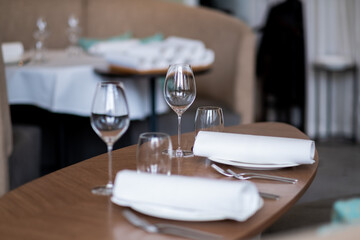 empty glass of water on the table with blur background