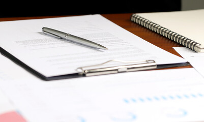 Financial charts on office desk. Home office work space. financial accounting strategy analysis concept
