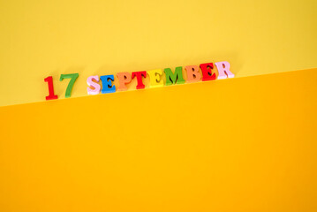 September 17 on a yellow and paper background.