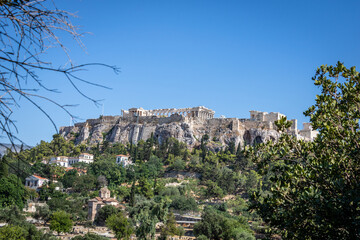 Fototapeta premium View of Acropolis and Parthenon in Athens Greece, seen from the Temple of Hephaestus