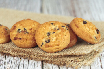Cookies in place  on wood table with concrete background