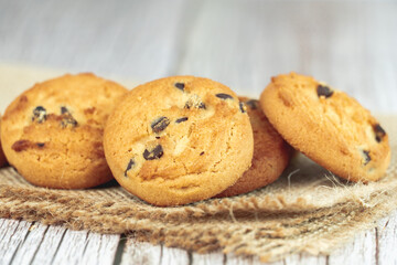 Cookies in place  on wood table with concrete background