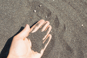 hand on sand