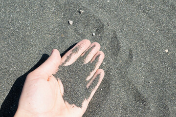 hand on sand