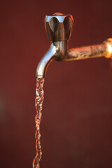 faucet with water drops