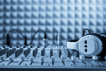 Closeup of sound mixer audio mixing console. Music concept in sound recording studio