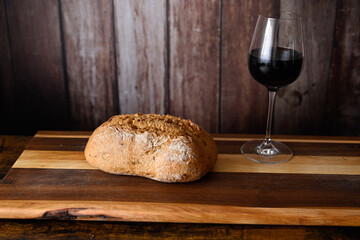 Homemade Wheat Bread and Glass of Red Wine