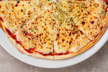cheesy pizza slice. Pizza is a savory dish of Italian origin, consisting of a usually round.