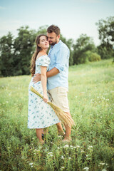Fototapeta premium woman and bearded man on field nature picnic