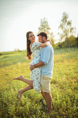 Fototapeta premium woman and bearded man on field nature picnic