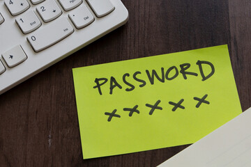 Password on note paper on desktop , Security Awareness concept