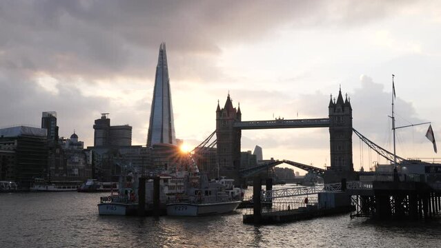 UK London City Skyline with Tower Bridge Opening for Ship in Evening