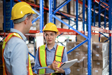 Fototapeta na wymiar worker person working with safety in warehouse logistic factory, business manufacturing industry occupation concept, goods product box distribution. Storehouse employee in uniform. warehouse worker.