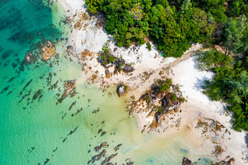 Koh Phayam beach Hin Talu with rock arch formation in Ranong, Thailand.