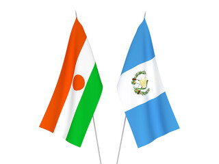 National fabric flags of Republic of the Niger and Republic of Guatemala isolated on white background. 3d rendering illustration.