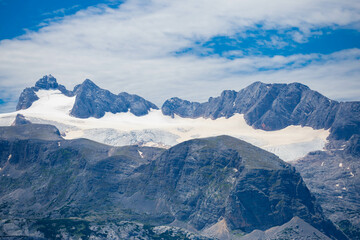 Dachstein Mountains and enjoys the landscape in Austria, Mountains - extreme wide panoramic. Dachstein