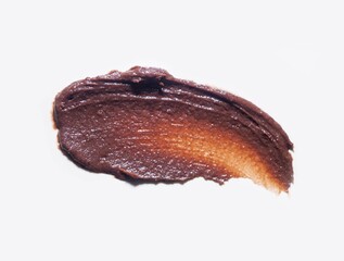 Cosmetic mask smudge sample texture. Chocolate mud, charcoal or  clay cleansing mask or face foam....
