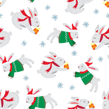 Decorative seamless Christmas pattern with cute rabbit and snowflakes © Irina Maister