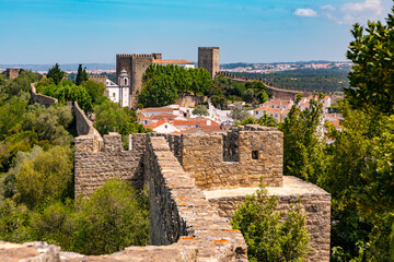 Fototapeta na wymiar The castle fortress of Obidos with the historic old town, which is completely surrounded by a walkable city wall, Portugal