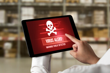 Virus warning alert on computer screen detected modish cyber threat , hacker, computer virus and...
