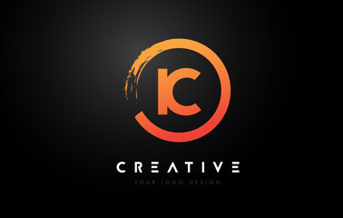 Obraz premium Orange IC Circular Letter Logo with Circle Brush Design and Black Background.