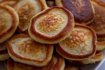 Close up fresh fluffy homemade pancakes on the plate. Ready to eat bakery for breakfast.