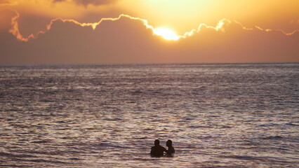 Sunset surfing in Maui Hawaii 9