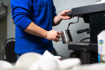 the process of making coffee. the guy makes coffee