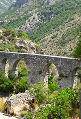 Fototapeta na wymiar Aqueduct in Stari Bar town near new city of Bar. Montenegro, Europe