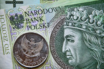 polski banknot,100 PLN, moneta indonezyjska, Polish banknote, 100 PLN, Indonesian coin - obrazy, fototapety, plakaty