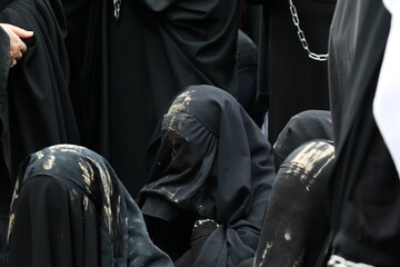 turkey muslim women and children chaining themselves at KERBELA mourning ceremony in Istanbul.Hz....