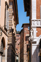 Narrow Alley Leading To The Famous Torre Guinigi