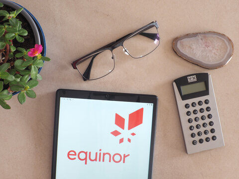 In this photo illustration, Equinor ASA (formerly Statoil and StatoilHydro) logo seen displayed on a tablet