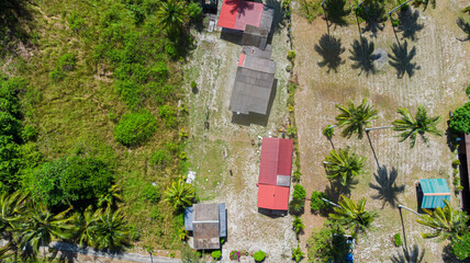Fototapeta na wymiar Aerial drone view of rural settlements at Besar Island (Pulau Besar or Pulau Babi Besar) in Mersing, Johor, Malaysia