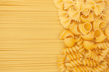 Background of different pasta types. copy space