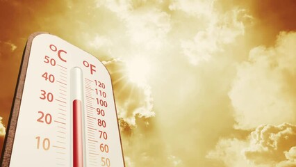 climate change, low angle view Thermometer on blue sky with sun shining in summer show increase temperature, concept global warming
