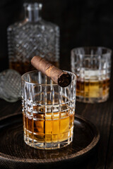 Glasses of  whiskey on dark background