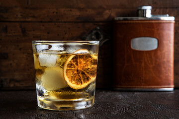 Close up of glass  with alcohol drink ( brandy, cognac,  whiskey)