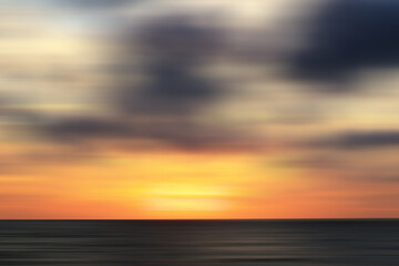 abstract blurred sunset at the beach