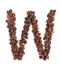 Capital letter W made from coffee beans. Coffee font. Alphabet made from coffee beans. White background. Roasted coffee beans.