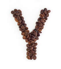 Capital letter Y made from coffee beans. Coffee font. Alphabet made from coffee beans. White background. Roasted coffee beans.