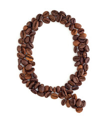 Capital letter Q made from coffee beans. Coffee font. Alphabet made from coffee beans. White background. Roasted coffee beans.