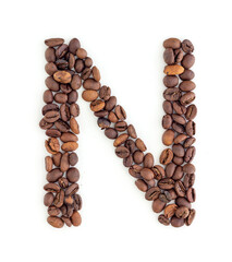 Capital letter N made from coffee beans. Coffee font. Alphabet made from coffee beans. White background. Roasted coffee beans.