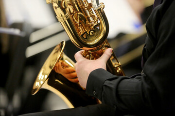 Closeup of Musician Playing Baritone Saxophone