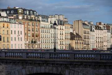 Obraz premium Beautiful picture of the Seine river bank in Paris near the Notre Dame cathedral, this French city is known as the city of love.