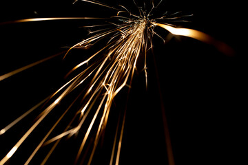 sparks in the dark. lines of light.