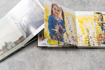Photo Books or Albums Provide Sweet Memory of Growing Up Process to Family Members. - obrazy, fototapety, plakaty