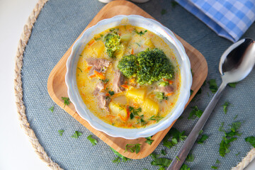 soup with broccoli on the plate