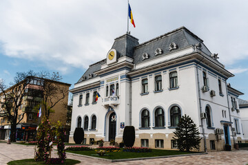 Fototapeta na wymiar Pitesti City Hall on Victoriei Street in the city center. Pitesti., Romania.